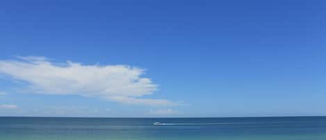 On the beach, sun-loungers, beach towels