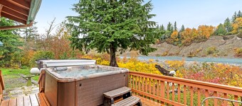 Luxury mountain cabin with river access & private hot tub - dog-friendly