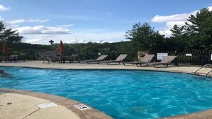 A swimming pool with lounge chairs and a sign indicating no diving allowed. - INDOOR POOL! CLOSE TO DOLLYWOOD!! (Pigeon Forge)