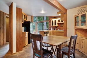 Dining - Riverfront cabin with soaring views of mountains & woodstove - dog-friendly (Baring)