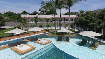 Outdoor pool, open 8:00 AM to 8:00 PM, pool umbrellas, pool loungers