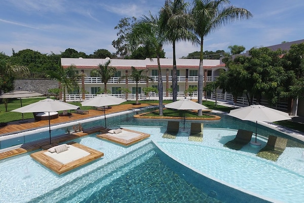 Outdoor pool, open 8:00 AM to 8:00 PM, pool umbrellas, sun loungers