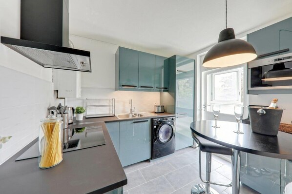 Microwave, oven, dining tables