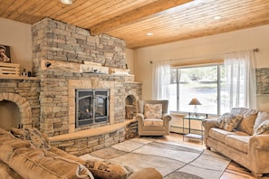 TV, fireplace, books