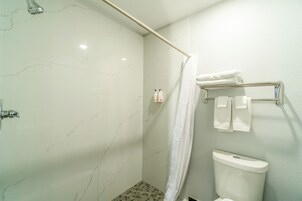 Shower, free toiletries, towels, soap
