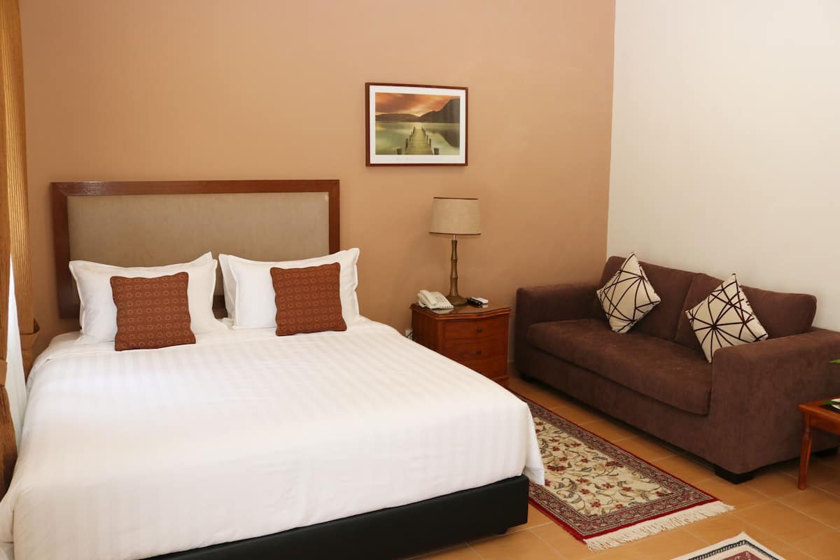 Chalet, Sea View | Minibar, desk, laptop workspace, iron/ironing board