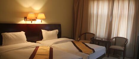 Standard Twin Room | Desk, blackout drapes, rollaway beds, free WiFi