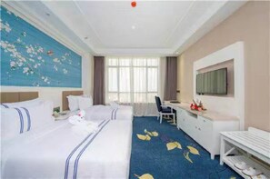 Deluxe Suite, 2 Bedrooms | Blackout curtains, free WiFi