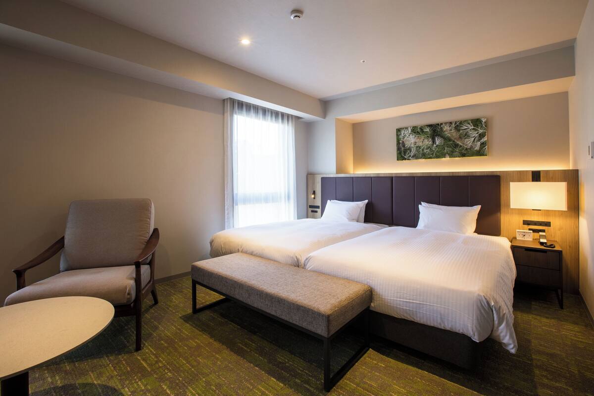 Corner Twin, 2 Guests | In-room safe, blackout drapes, iron/ironing board (on request)