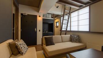 Tanuki Studio Apartment L3 | Living area | Flat-screen TV, heated floors