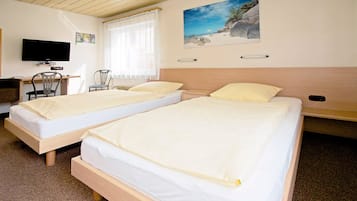Een strijkplank/strijkijzer, gratis wifi, beddengoed