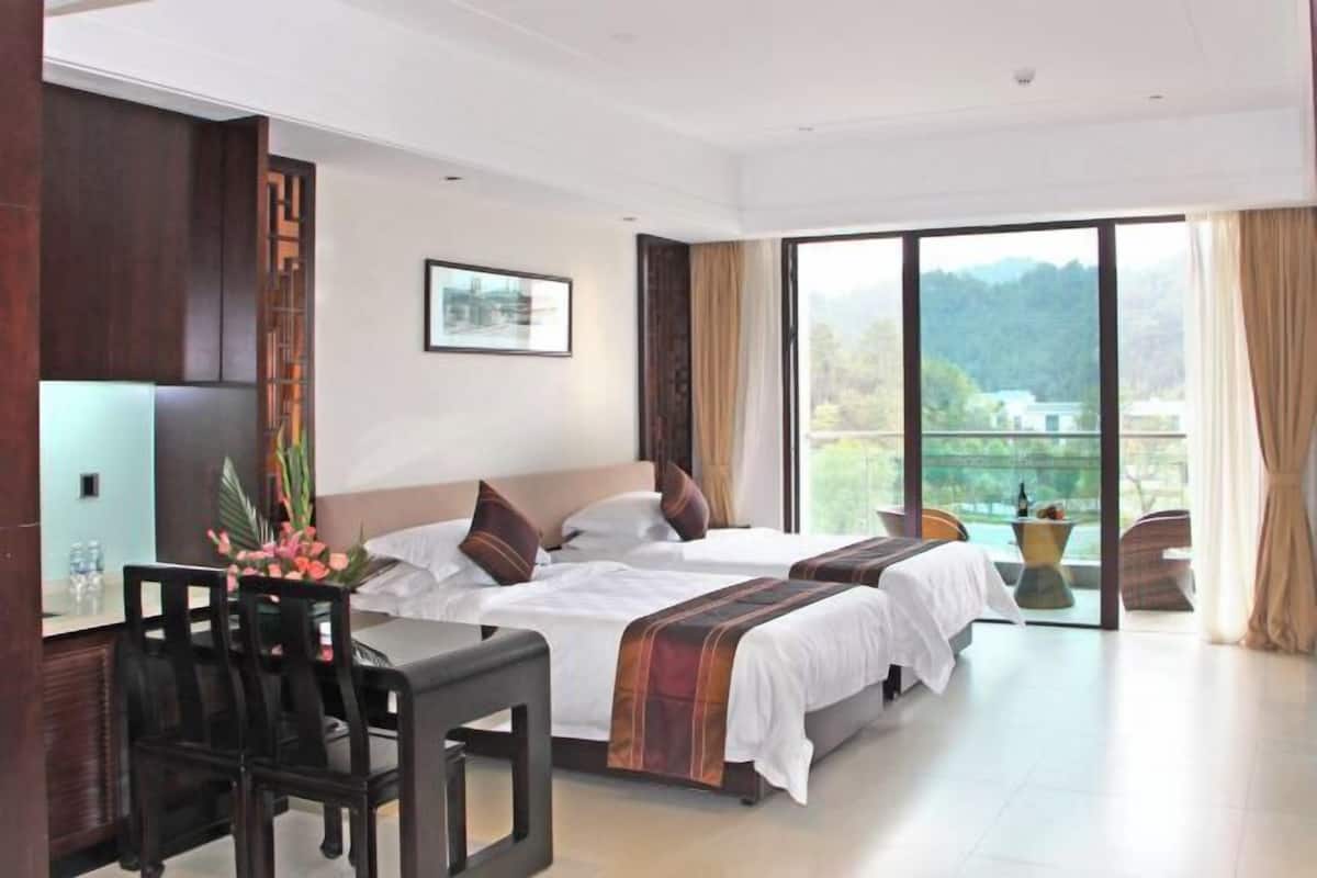 Blackout curtains, soundproofing, free WiFi, bed sheets