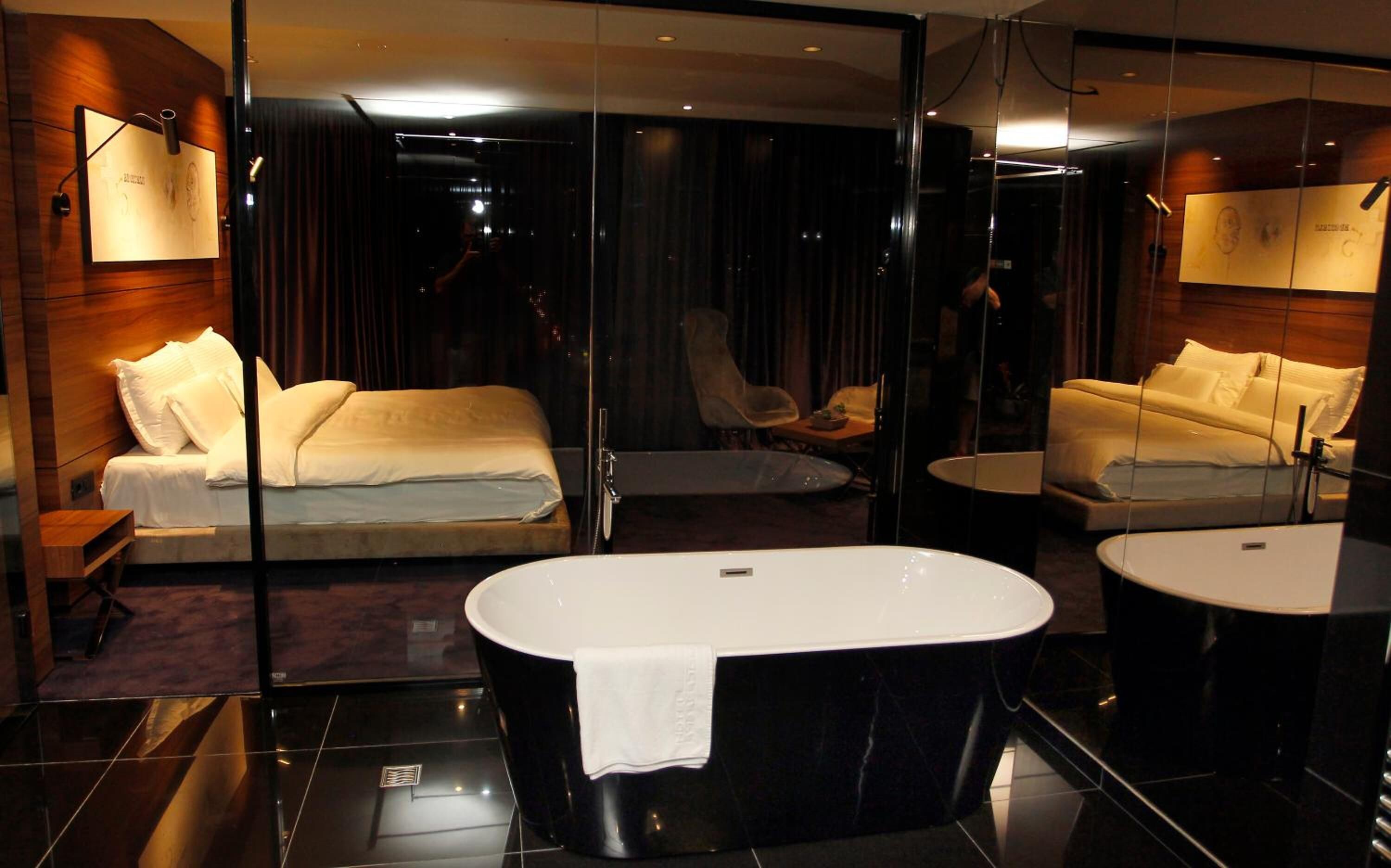 designer toiletries, hair dryer, bathrobes, slippers