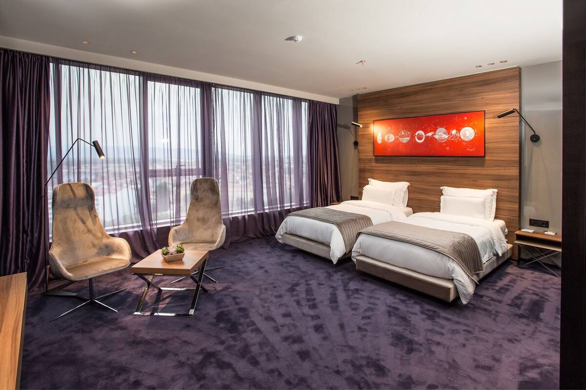 Superior Double or Twin Room | Minibar, in-room safe, desk, blackout drapes