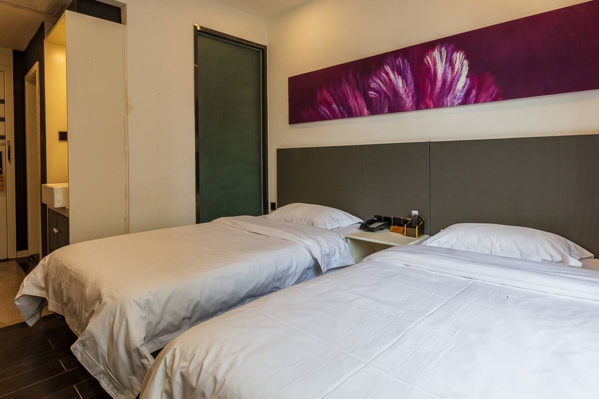 Business Twin Room  (Mainland Chinese Citizen Only) | Blackout drapes, free WiFi, bed sheets