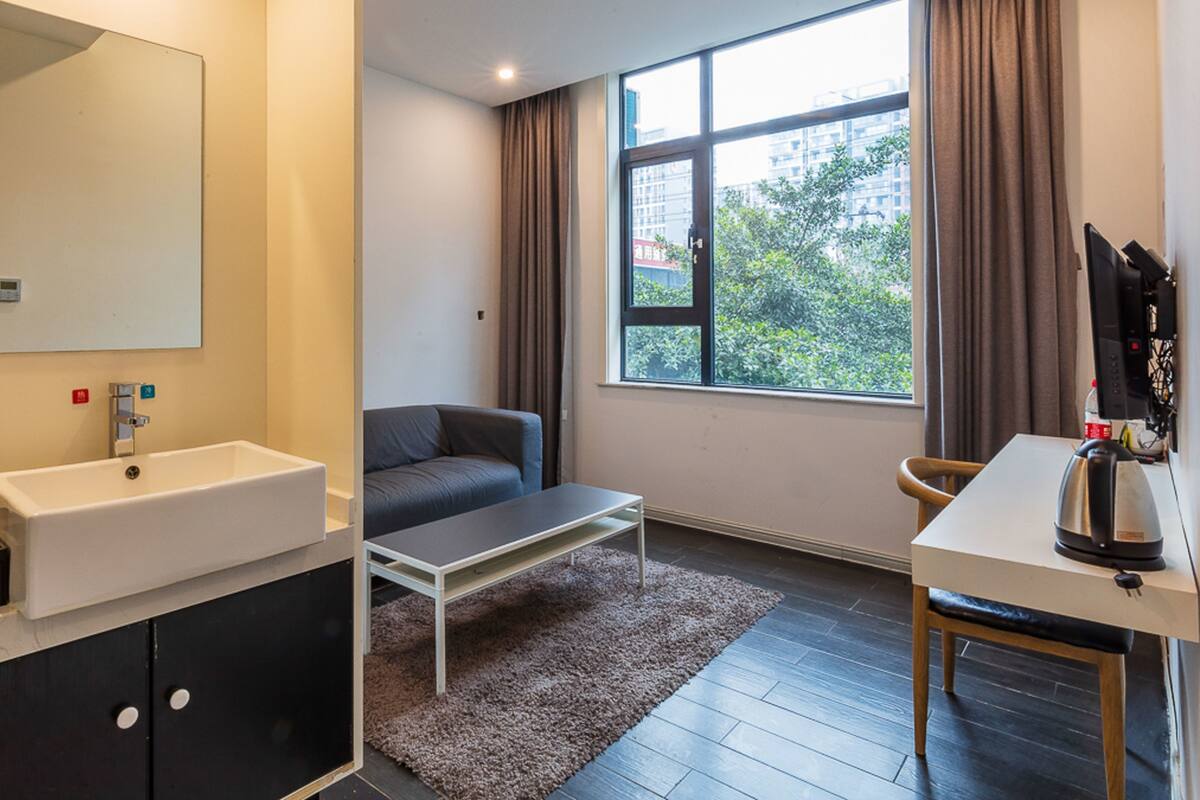 Deluxe Suite (Mainland Chinese Citizen Only) | Blackout drapes, free WiFi, bed sheets