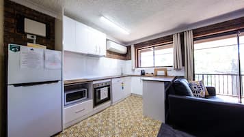 Leski Apartment No.8 | Private kitchen | Fridge, microwave, stovetop, coffee/tea maker