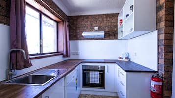 Leski Apartment No.7 | Private kitchen | Fridge, microwave, stovetop, coffee/tea maker