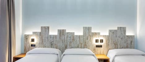 Quadruple Room | Down comforters, in-room safe, desk, soundproofing