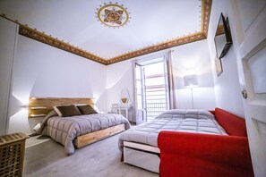 Comfort Quadruple Room, Balcony (Orlando) | In-room safe, individually furnished, desk, laptop workspace - B&B Opera dei Pupi (Palermo)