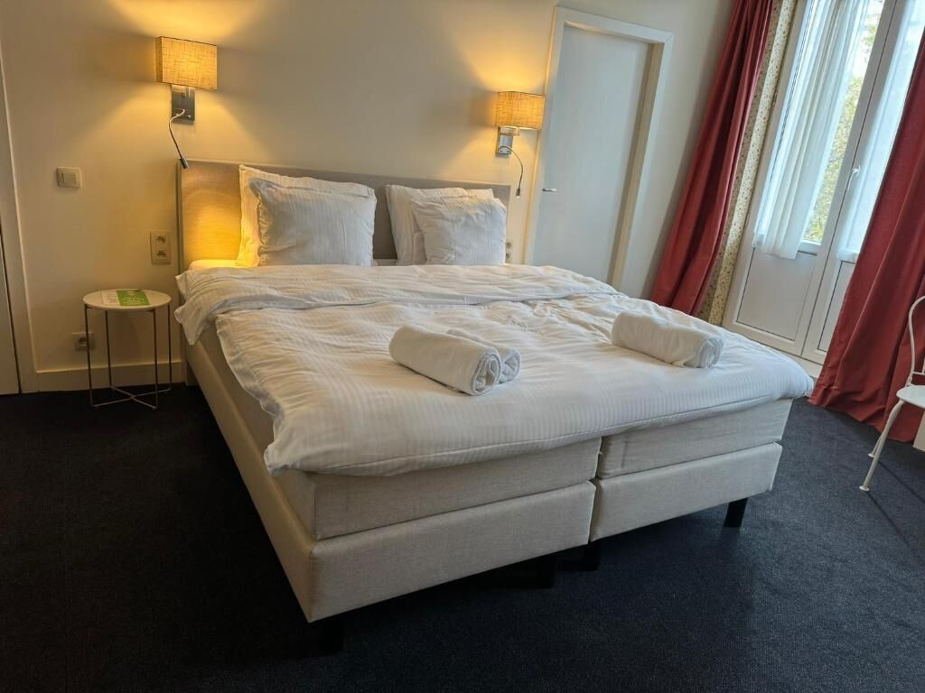Premium bedding, memory-foam beds, in-room safe, individually decorated