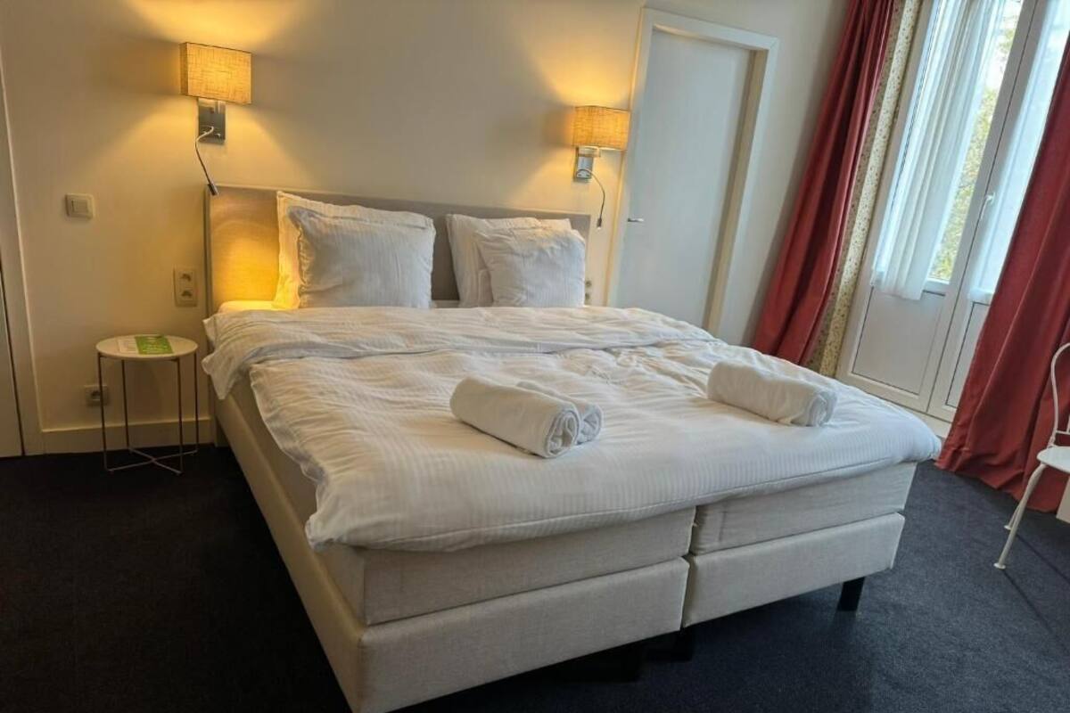Premium bedding, memory foam beds, in-room safe, desk