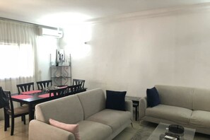 Leilighet, 1 soverom | Oppholdsrom | Flatskjerm-TV