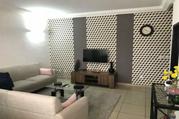 Appartamento, 1 camera da letto | Soggiorno | TV a schermo piatto