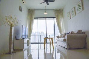 Comfort Apartment, 2 Bedrooms | Living room | Flat-screen TV - OHO Suites KLCC Setia Sky (Kuala Lumpur)