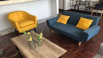 Standard Apartment | Living area | 42-inch flat-screen TV with satellite channels, TV