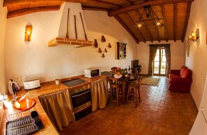 Departamento, 1 habitación | Cocina privada | Refrigerador con congelador, microondas, horno y parrilla de estufa