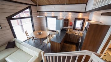 Duplex Cottage | Area keluarga | TV dan perapian