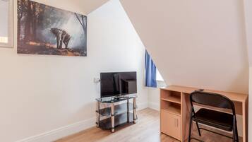 Basic Double Room, Shared Bathroom | Television