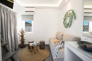 Junior Suite, Terrace | Living area | Flat-screen TV - Jonaz Rooms & Suites (Mykonos)