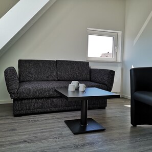 Apartment, 1 Bedroom | Living area | LED TV