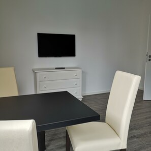 Apartment, 1 Bedroom | Living area | LED TV