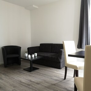 Appartement, 1 chambre | Coin séjour