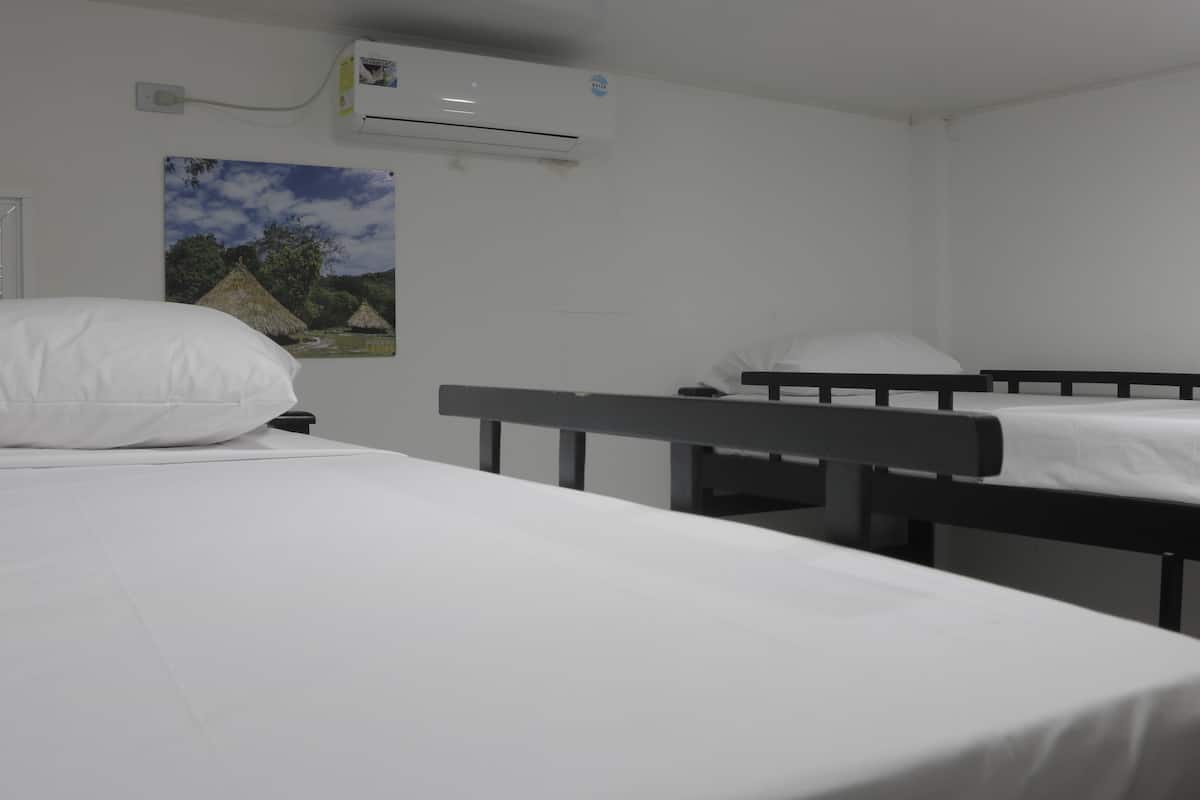 4 bedrooms, premium bedding, free WiFi, bed sheets