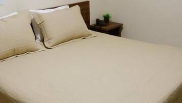 Frigobar, cortinas blackout, Wi-Fi de cortesia, roupa de cama
