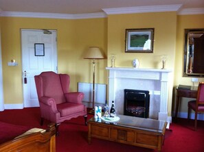 Suite Junior | Aire de séjour | Téléviseur à écran plat