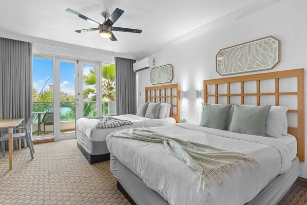 Desk, blackout drapes, iron/ironing board, travel crib