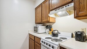 Unclassified image, 5 of 32, button - Deluxe 1 Bedroom Queen Suite outdoor pool 202 (Killington)
