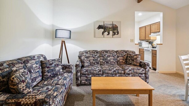 Unclassified image, 1 of 32, button - Deluxe 1 Bedroom Queen Suite outdoor pool 202 (Killington)