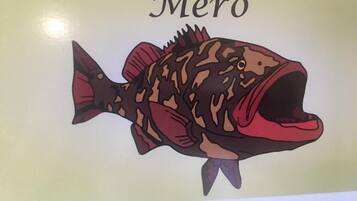 A fish illustration with the word "Mero" above it.