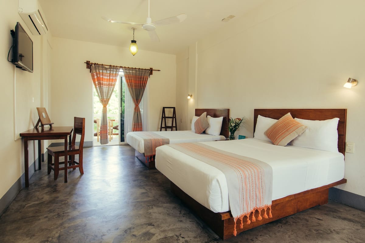 Suite, 2 Double Beds | WiFi (free), bed sheets