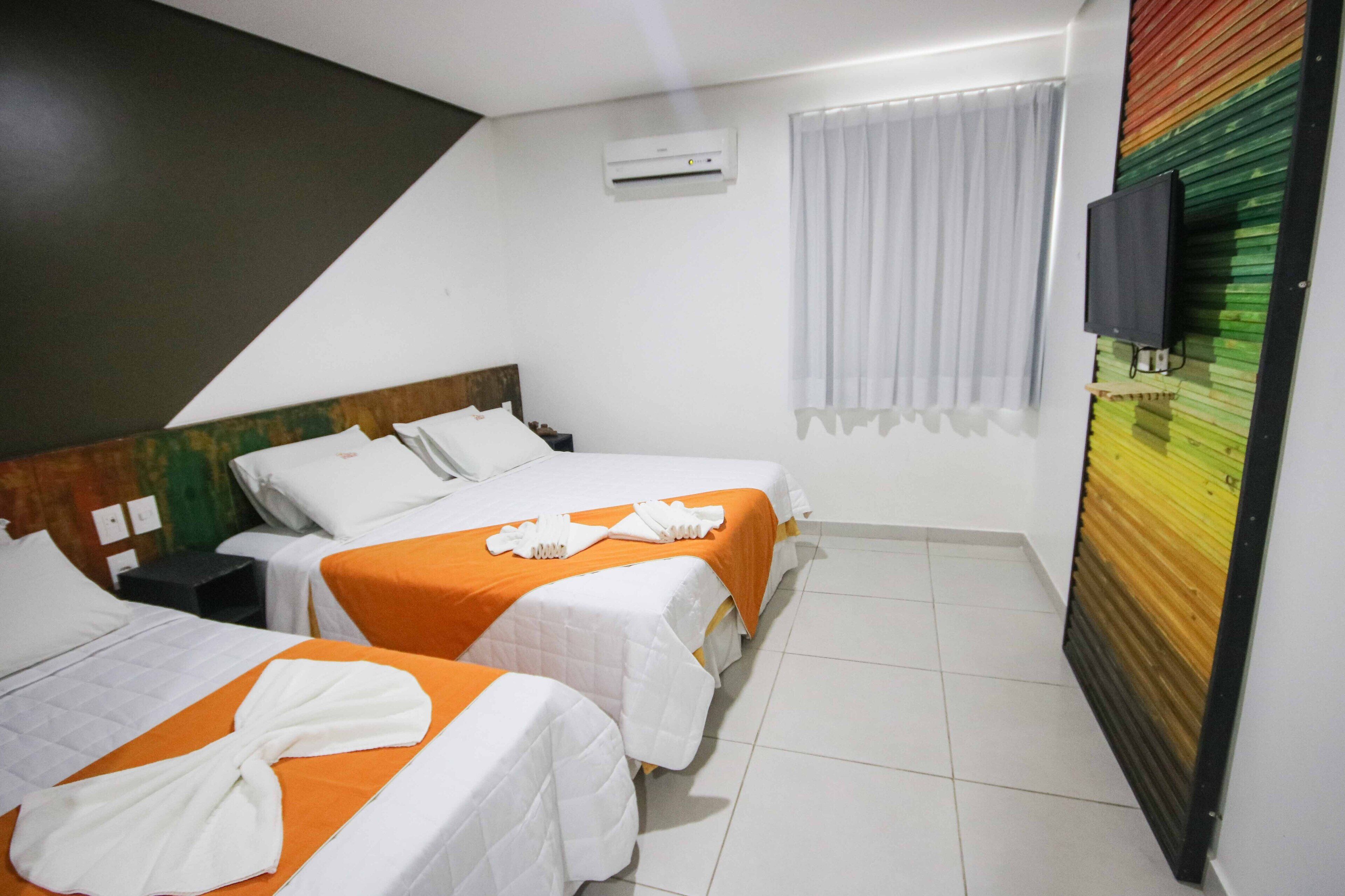 Standard Triple Room | Minibar, blackout drapes, cribs/infant beds, free WiFi