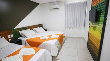 Standard Triple Room | Minibar, blackout curtains, cots/infant beds, free WiFi