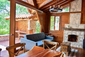 Grand Chalet, 1 Bedroom, Kitchenette | Living area | 43-inch Smart TV with cable channels, TV - Hotel Zidada and Chalets (Ezequiel Montes)
