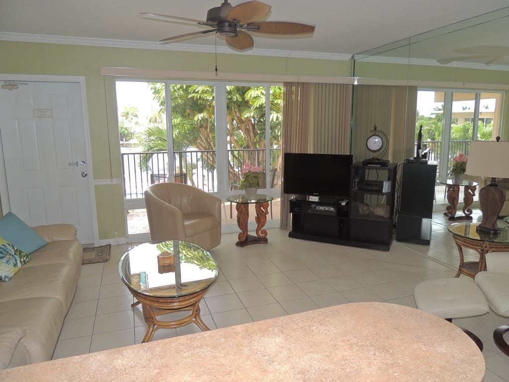 Comfort Condo, 1 Bedroom (Intracoastal View) | Living area | Flat-screen TV