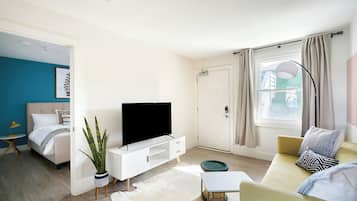 Superior Apartment, 1 Bedroom | Living room | Flat-screen TV